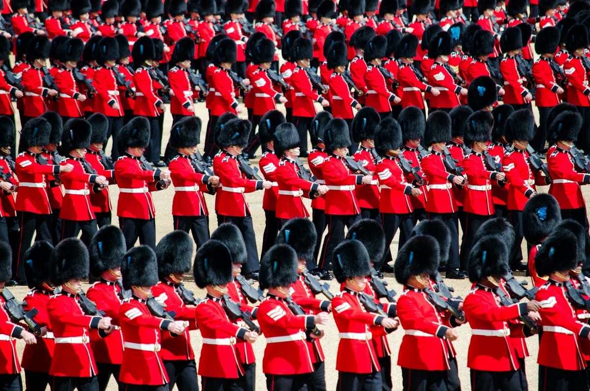Soldiers of the British Army’s Foot Guards parade in London (Photo by Roberto Catarinicchia on Unsplash)